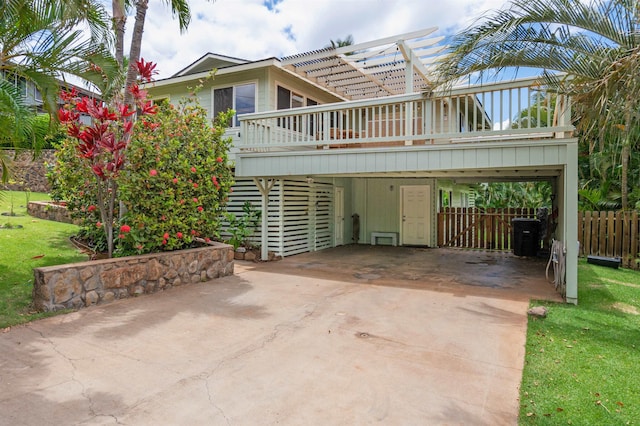 473 Kalalau Pl, Kihei, HI 96753 - rear view of property featuring concrete driveway and a deck