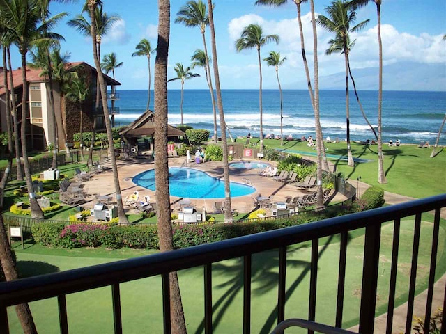 view of pool featuring a water view