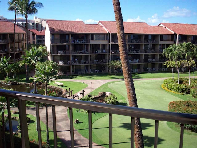 view of home's community with a water view