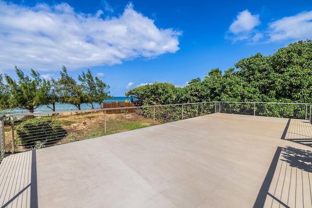 view of patio with a water view