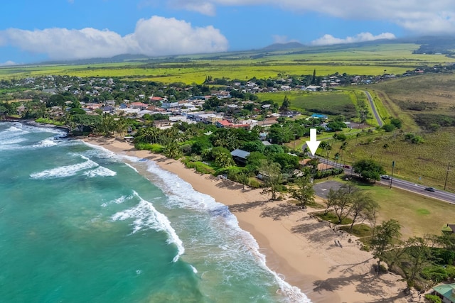 bird's eye view with a view of the beach and a water view