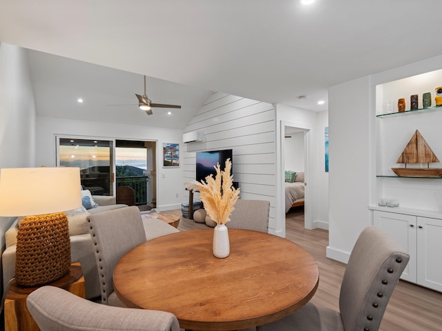 3950 Kalai Waa St Unit C202, Kihei, HI 96753 - dining space with a wall unit AC, light wood finished floors, a ceiling fan, recessed lighting, and vaulted ceiling