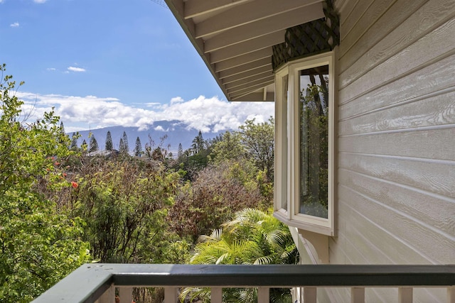 balcony featuring a mountain view