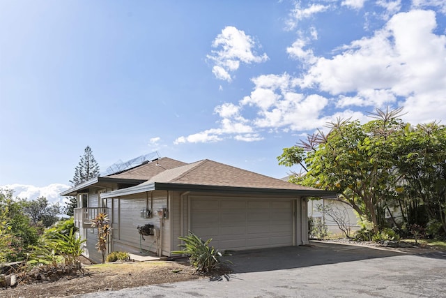 garage featuring driveway