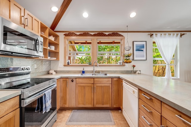 19 Hoku Pl, Paia, HI 96779 - kitchen featuring appliances with stainless steel finishes, a sink, healthy amount of natural light, light countertops, and recessed lighting
