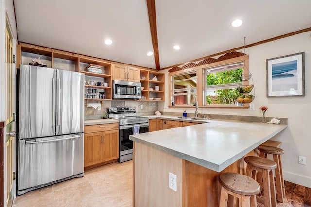19 Hoku Pl, Paia, HI 96779 - kitchen featuring stainless steel appliances, open shelves, a sink, a peninsula, and light countertops