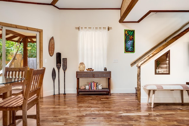 19 Hoku Pl, Paia, HI 96779 - entryway featuring baseboards, wood finished floors, and crown molding