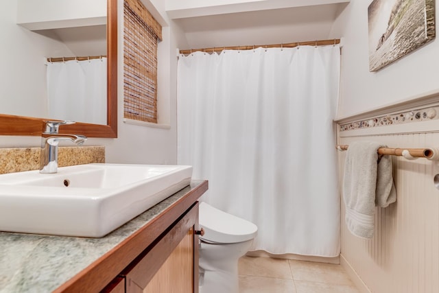 19 Hoku Pl, Paia, HI 96779 - bathroom featuring vanity, toilet, and tile patterned flooring