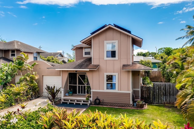 19 Hoku Pl, Paia, HI 96779 - back of property featuring board and batten siding and a shingled roof