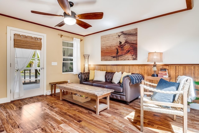 19 Hoku Pl, Paia, HI 96779 - living area featuring ornamental molding, a ceiling fan, and wood finished floors