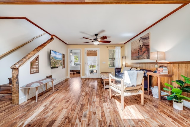 19 Hoku Pl, Paia, HI 96779 - living area featuring ceiling fan, wood finished floors, ornamental molding, and stairway