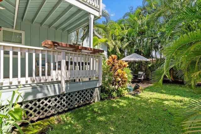 view of yard with a deck