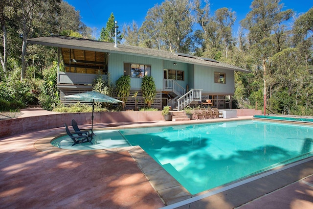 pool with a patio