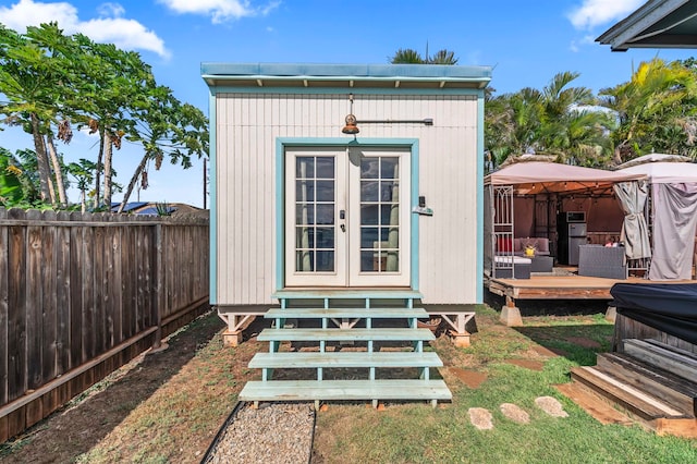 view of outbuilding with a gazebo and french doors