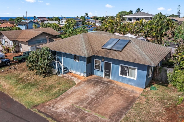 view of front of home with a front lawn