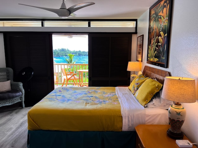 bedroom with hardwood / wood-style flooring and ceiling fan