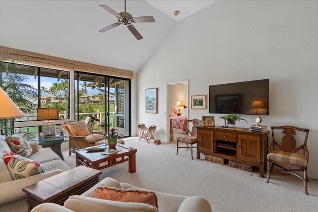 living room featuring ceiling fan, carpet flooring, and high vaulted ceiling