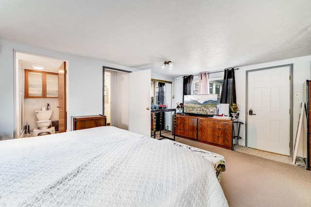 2120 Onaona St, Wailuku, HI 96793 - carpeted bedroom with connected bathroom and a textured ceiling