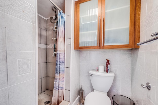 2120 Onaona St, Wailuku, HI 96793 - bathroom with a shower stall, tile walls, and toilet