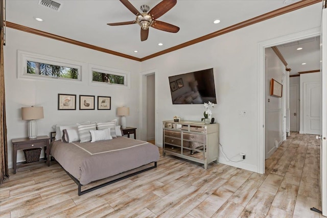 bedroom with ceiling fan, light hardwood / wood-style flooring, and ornamental molding