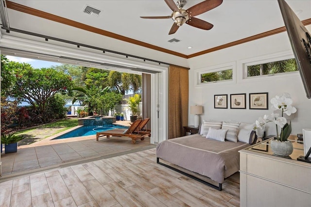 bedroom with ceiling fan and ornamental molding