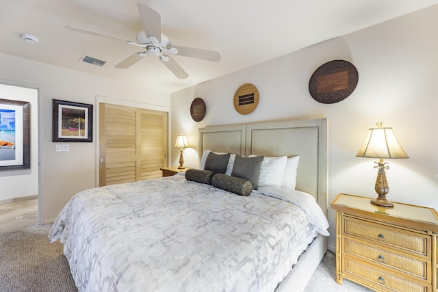 160 Pualei Dr Unit 160-4, Lahaina, HI 96761 - bedroom with light carpet, a closet, baseboards, and ceiling fan