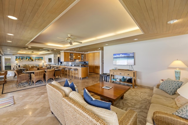 160 Pualei Dr Unit 160-4, Lahaina, HI 96761 - living room featuring ceiling fan, a raised ceiling, recessed lighting, and baseboards
