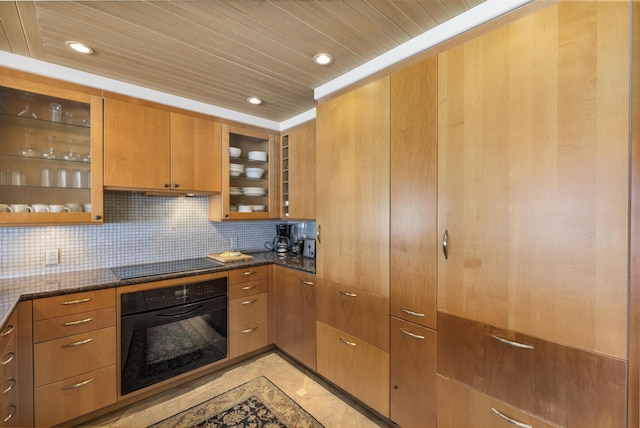 160 Pualei Dr Unit 160-4, Lahaina, HI 96761 - kitchen with black appliances, dark stone countertops, glass insert cabinets, recessed lighting, and backsplash