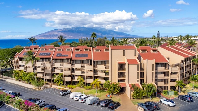 view of building exterior featuring a mountain view