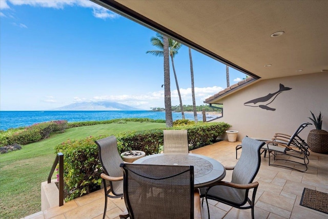 4850 Makena Alanui Rd Unit F-108, Kihei, HI 96753 - view of patio / terrace with a water and mountain view and outdoor dining space