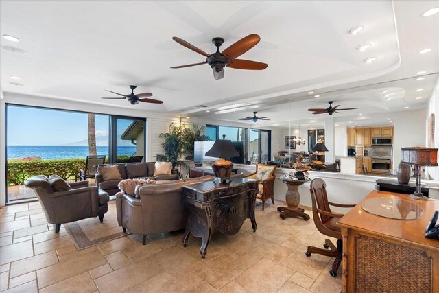 4850 Makena Alanui Rd Unit F-108, Kihei, HI 96753 - living area featuring recessed lighting, a raised ceiling, and stone tile floors