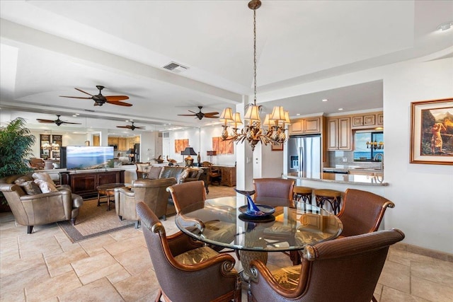 4850 Makena Alanui Rd Unit F-108, Kihei, HI 96753 - dining area featuring stone tile flooring, a raised ceiling, visible vents, and an inviting chandelier