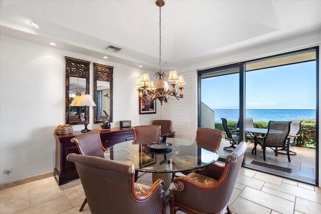 4850 Makena Alanui Rd Unit F-108, Kihei, HI 96753 - dining area featuring baseboards, visible vents, a water view, a notable chandelier, and recessed lighting