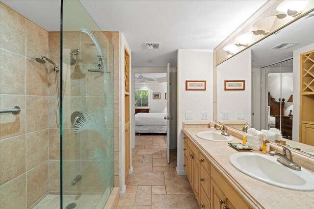 4850 Makena Alanui Rd Unit F-108, Kihei, HI 96753 - ensuite bathroom featuring ensuite bathroom, a sink, visible vents, and stone tile floors