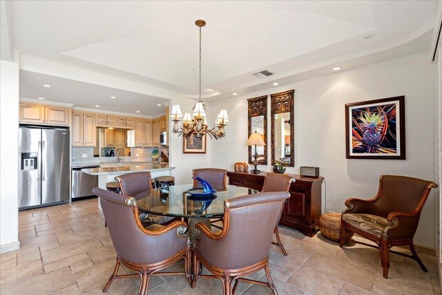 4850 Makena Alanui Rd Unit F-108, Kihei, HI 96753 - dining room featuring a notable chandelier, a tray ceiling, visible vents, and stone tile floors
