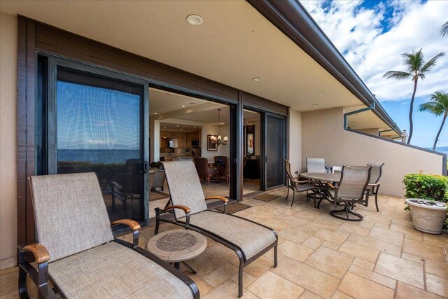 4850 Makena Alanui Rd Unit F-108, Kihei, HI 96753 - view of patio featuring outdoor dining space