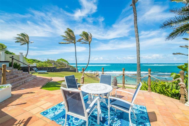 view of patio / terrace with a water view