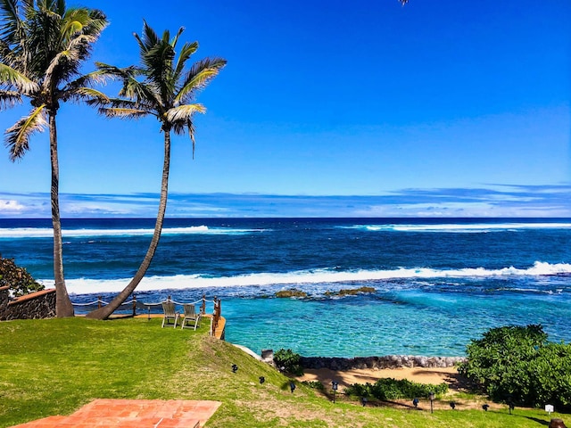 property view of water featuring a beach view