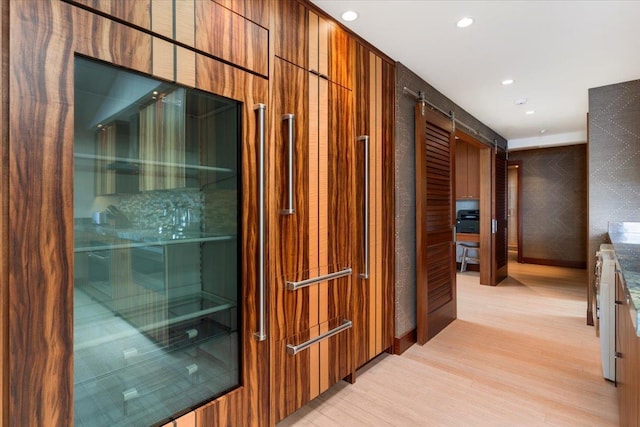 hallway featuring light hardwood / wood-style floors