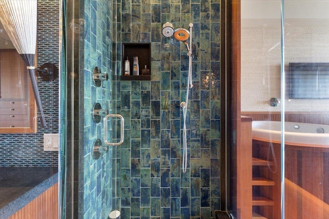 bathroom featuring an enclosed shower