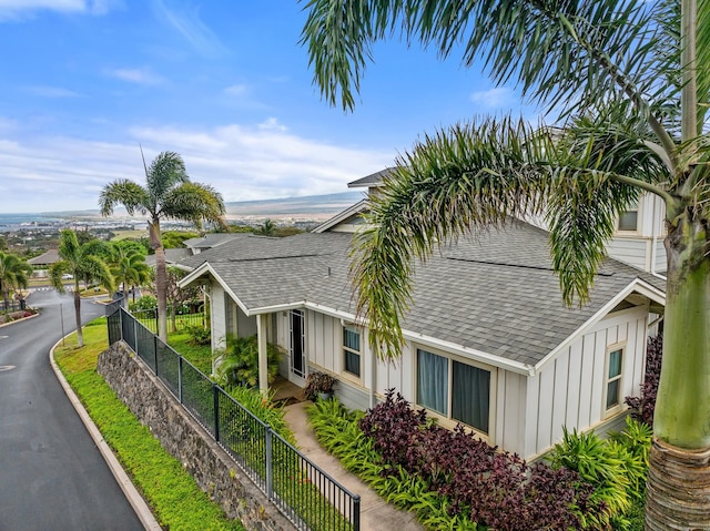 123 Hoowaiwai Loop Unit 1801, Wailuku, HI 96793 - view of side of home featuring board and batten siding and a shingled roof