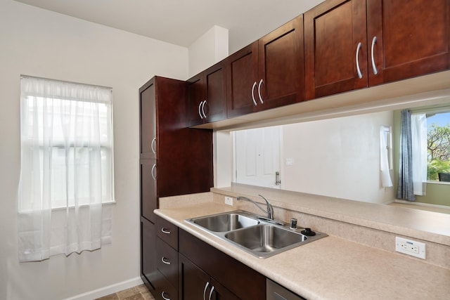 123 Hoowaiwai Loop Unit 1801, Wailuku, HI 96793 - kitchen with a sink, light countertops, and baseboards
