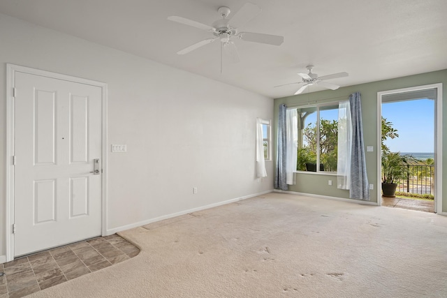 123 Hoowaiwai Loop Unit 1801, Wailuku, HI 96793 - spare room with baseboards, carpet, and ceiling fan