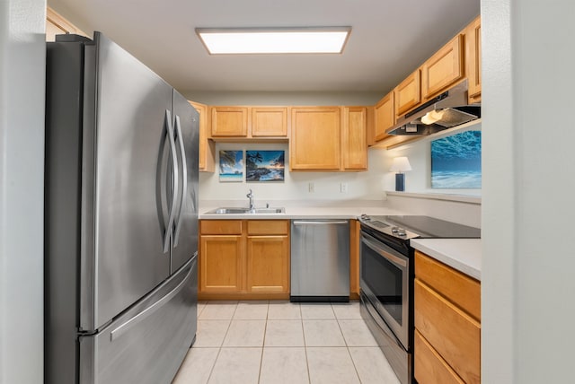 kitchen with light brown cabinets, sink, light tile flooring, and appliances with stainless steel finishes