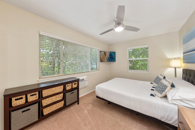 bedroom with ceiling fan and carpet flooring