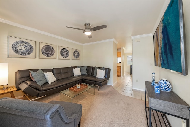 living room featuring ornamental molding, ceiling fan, and light colored carpet