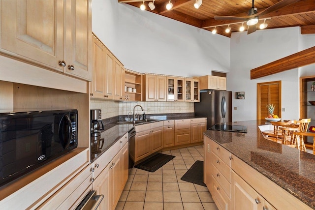 kitchen with wood ceiling, light brown cabinetry, black appliances, beam ceiling, and sink