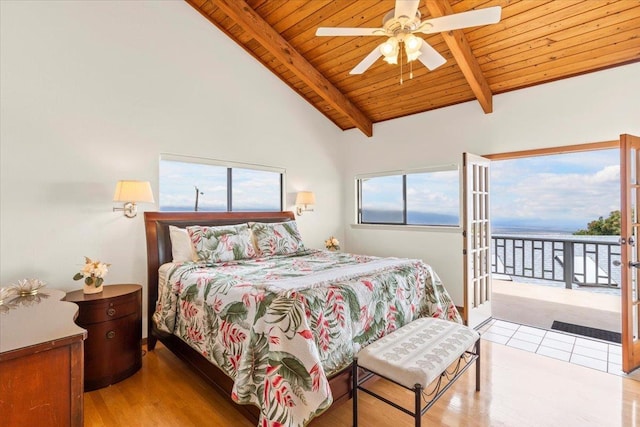 bedroom with vaulted ceiling with beams, light hardwood / wood-style floors, access to outside, ceiling fan, and wooden ceiling