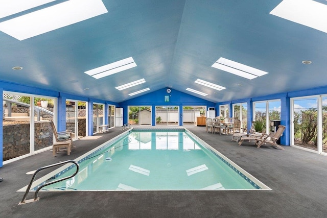 view of pool featuring a skylight