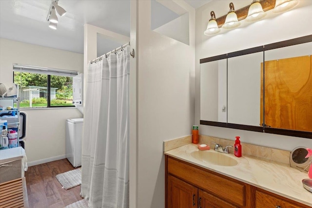 bathroom with vanity and hardwood / wood-style floors